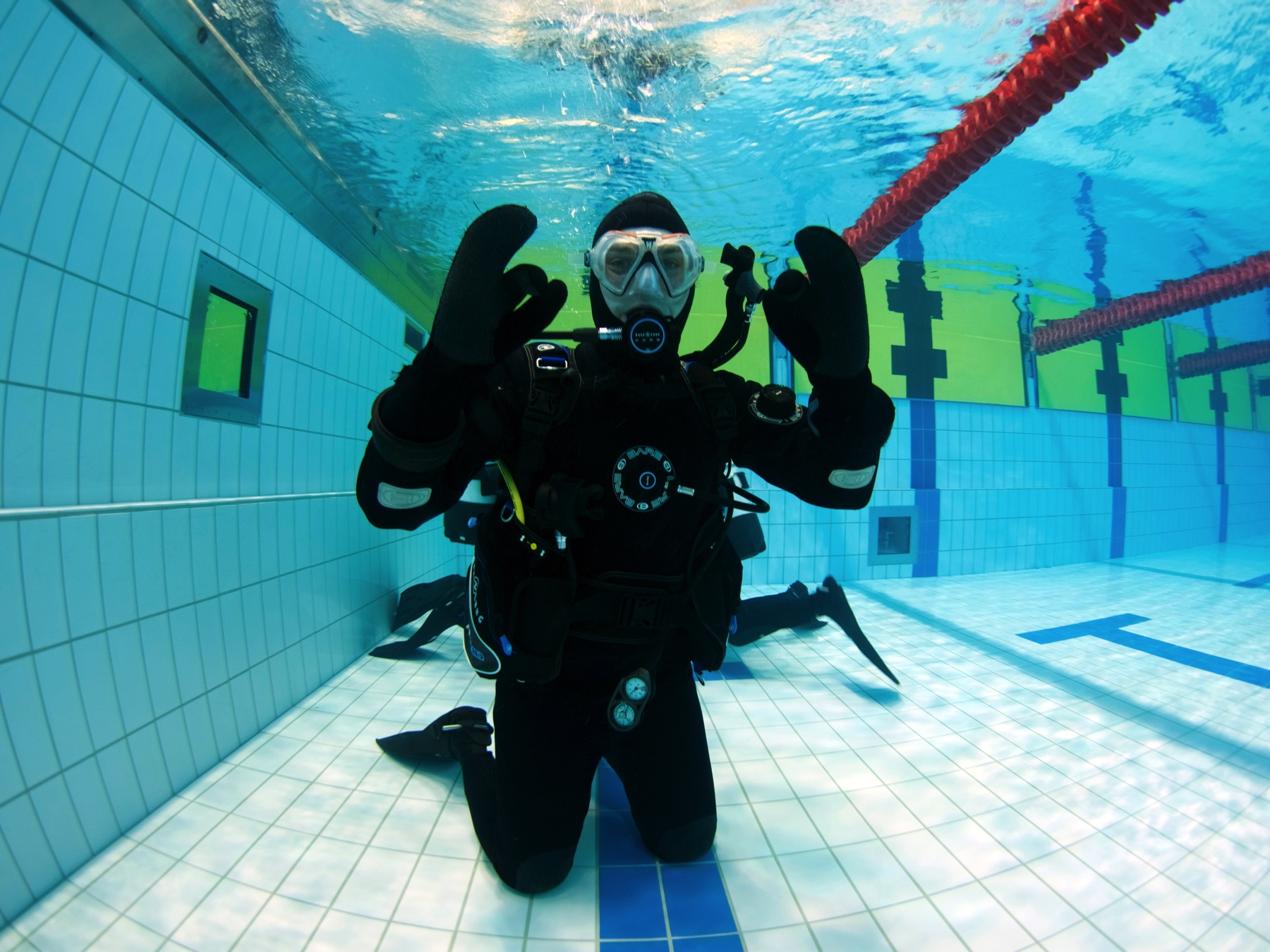 Dry suit course student learning dry suit diving in Iceland