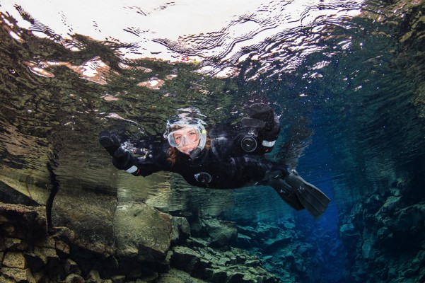 Snorkeling in Silfra fissure in crystal clear water