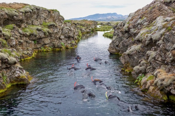 Snorkeling between the tectonic plates at Silfra fissure in Iceland