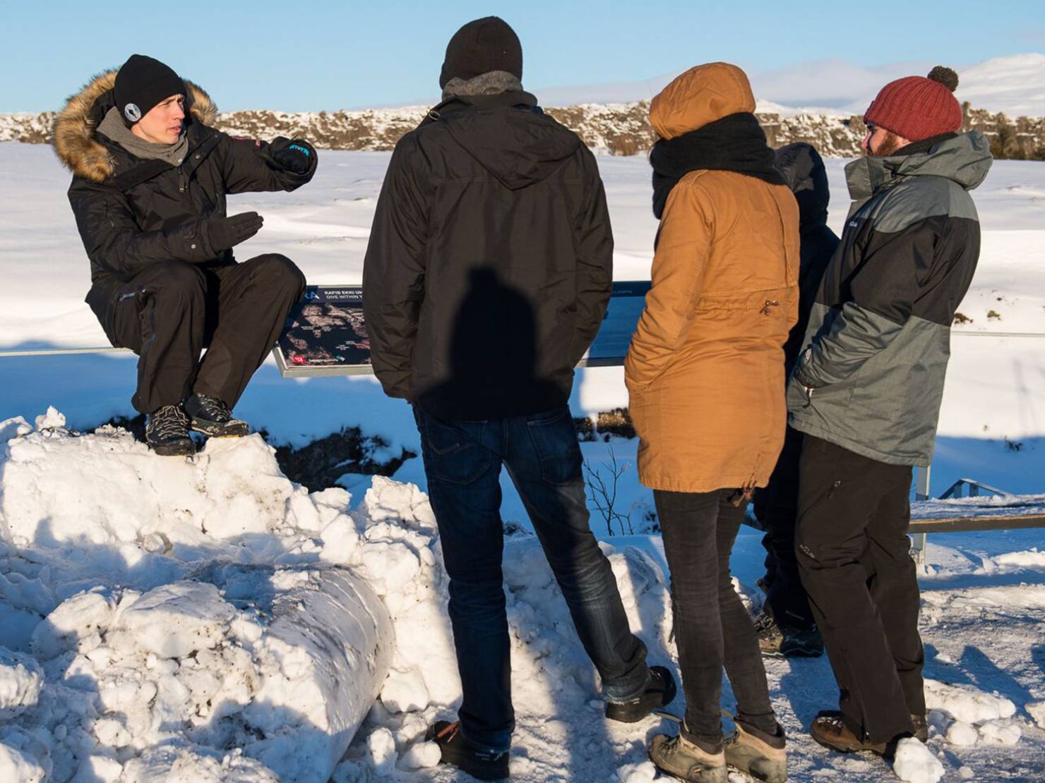 Our guide giving his customers a briefing before their snorkeling tour in Icelandic winter time